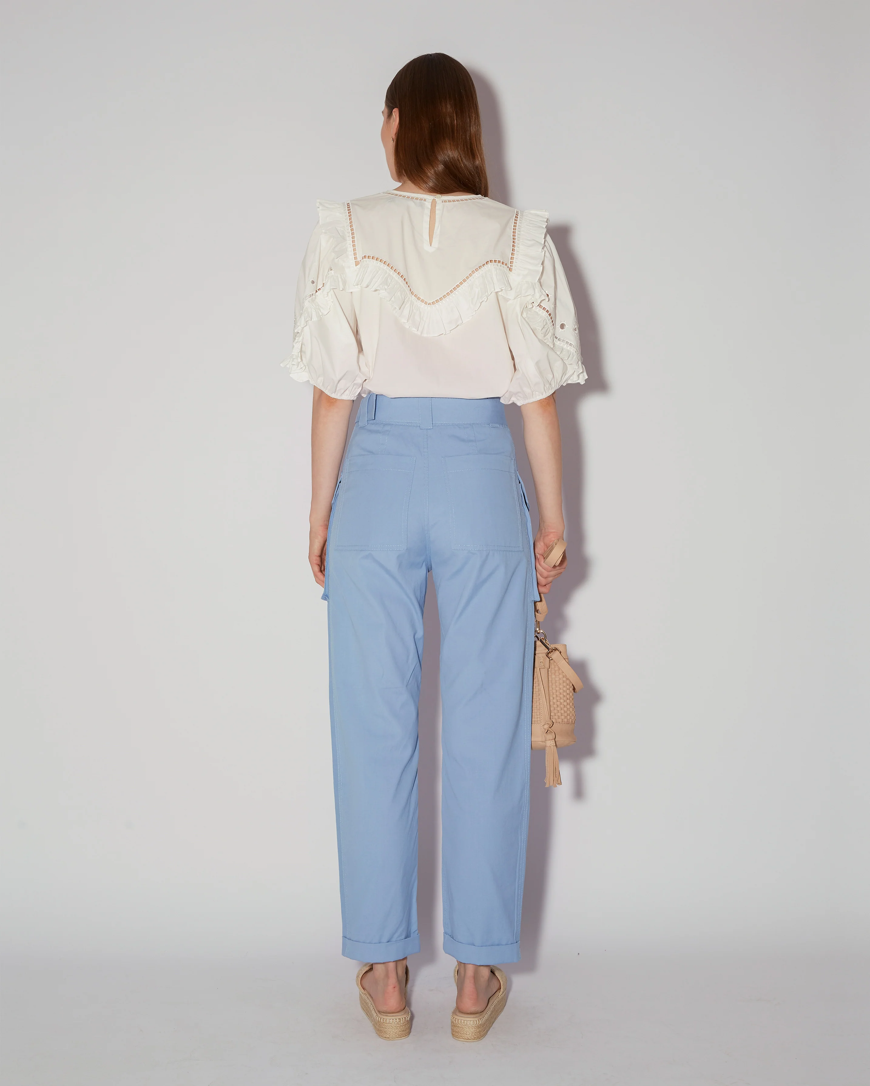 Elegant White Embroidered Blouse With Ruffled Details