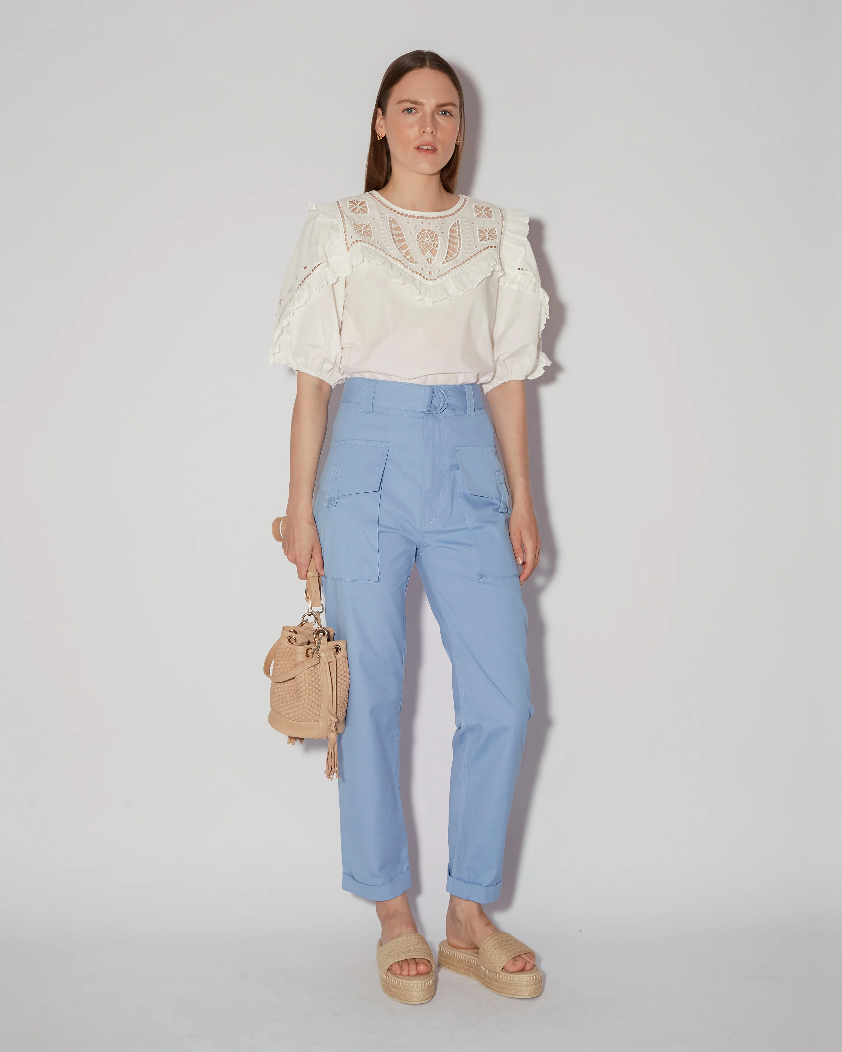 Elegant White Embroidered Blouse With Ruffled Details
